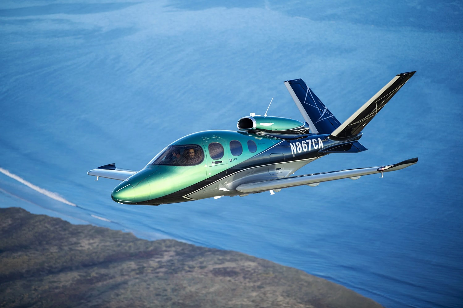 Green cirrius vision jet flying
